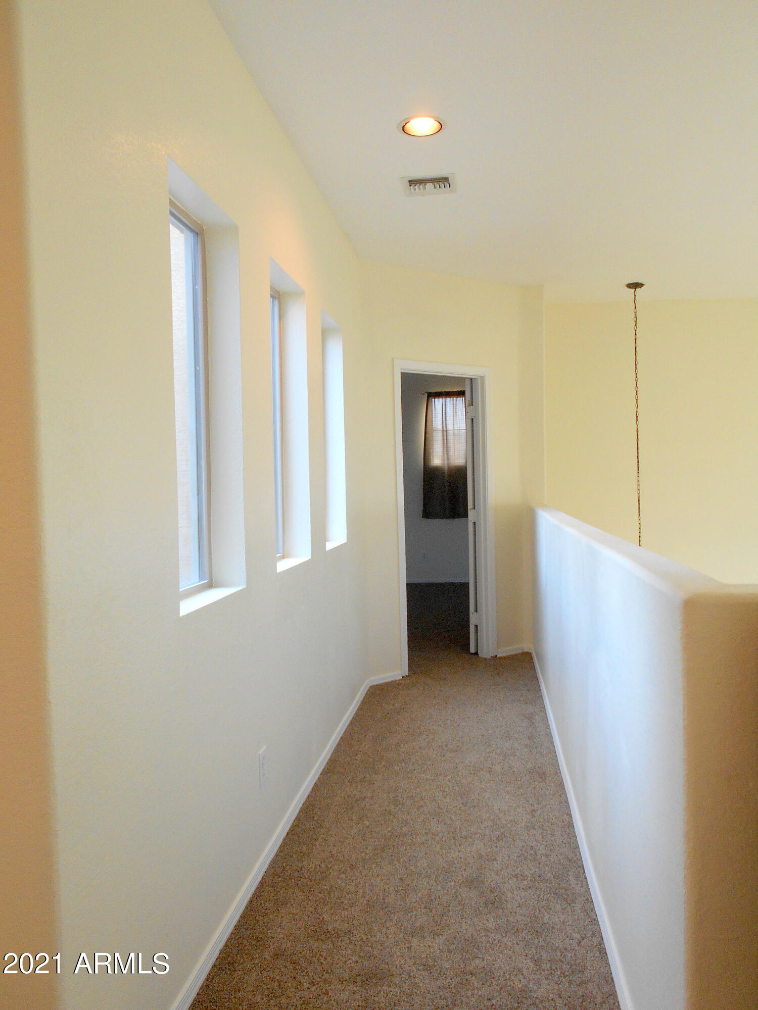 9434 West Berkeley Road Phoenix, AZ 85037 - Photo 22 of 25 HALL TO BEDROOM 4