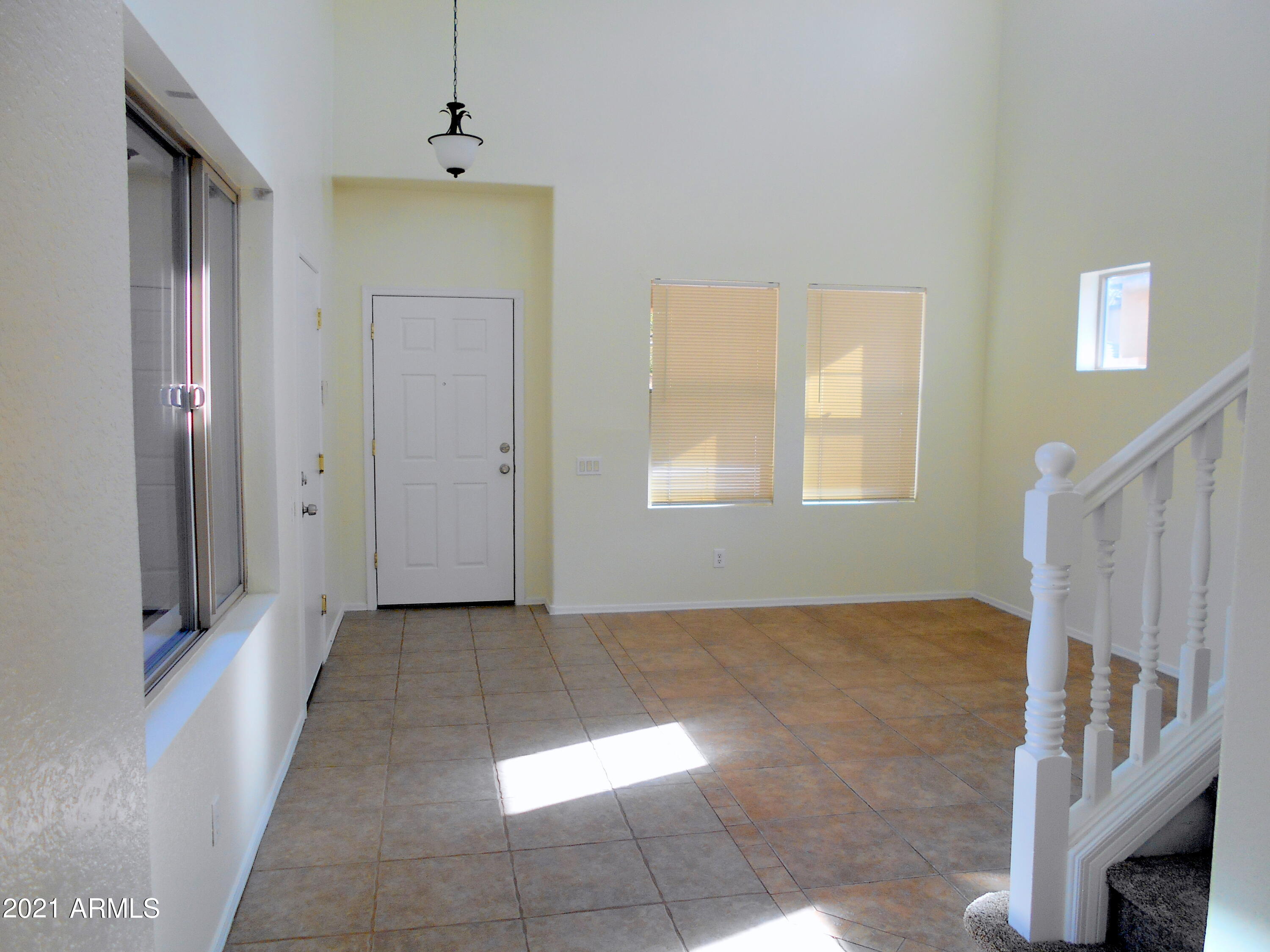 9434 West Berkeley Road Phoenix, AZ 85037 - Photo 3 of 25 FORMAL LIVING ROOM