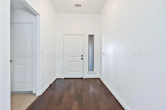 a view of a backyard with a patio