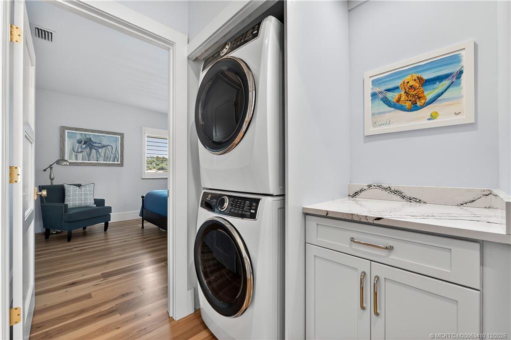 12445 Harbour Ridge Boulevard, Unit 38 Palm City, FL 34990 - Photo 32 of 46 a view of a hallway with washer and dryer