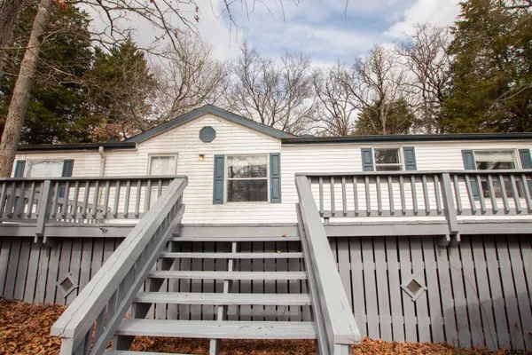 a view of a house with a deck