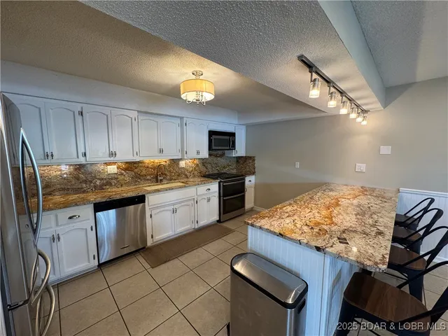 $729,000 | 221 Liahona Lane, Sunrise Beach, MO 65079