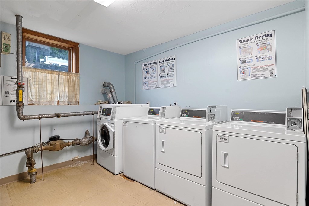 46 Gibbs Street, Unit 1D Worcester, MA 01607 - Photo 17 of 17 a view of storage and utility room with washer and dryer