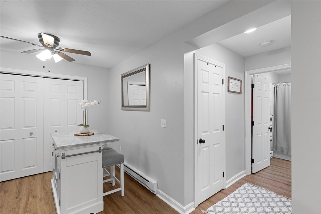 46 Gibbs Street, Unit 1D Worcester, MA 01607 - Photo 9 of 17 a view of a hallway with workspace