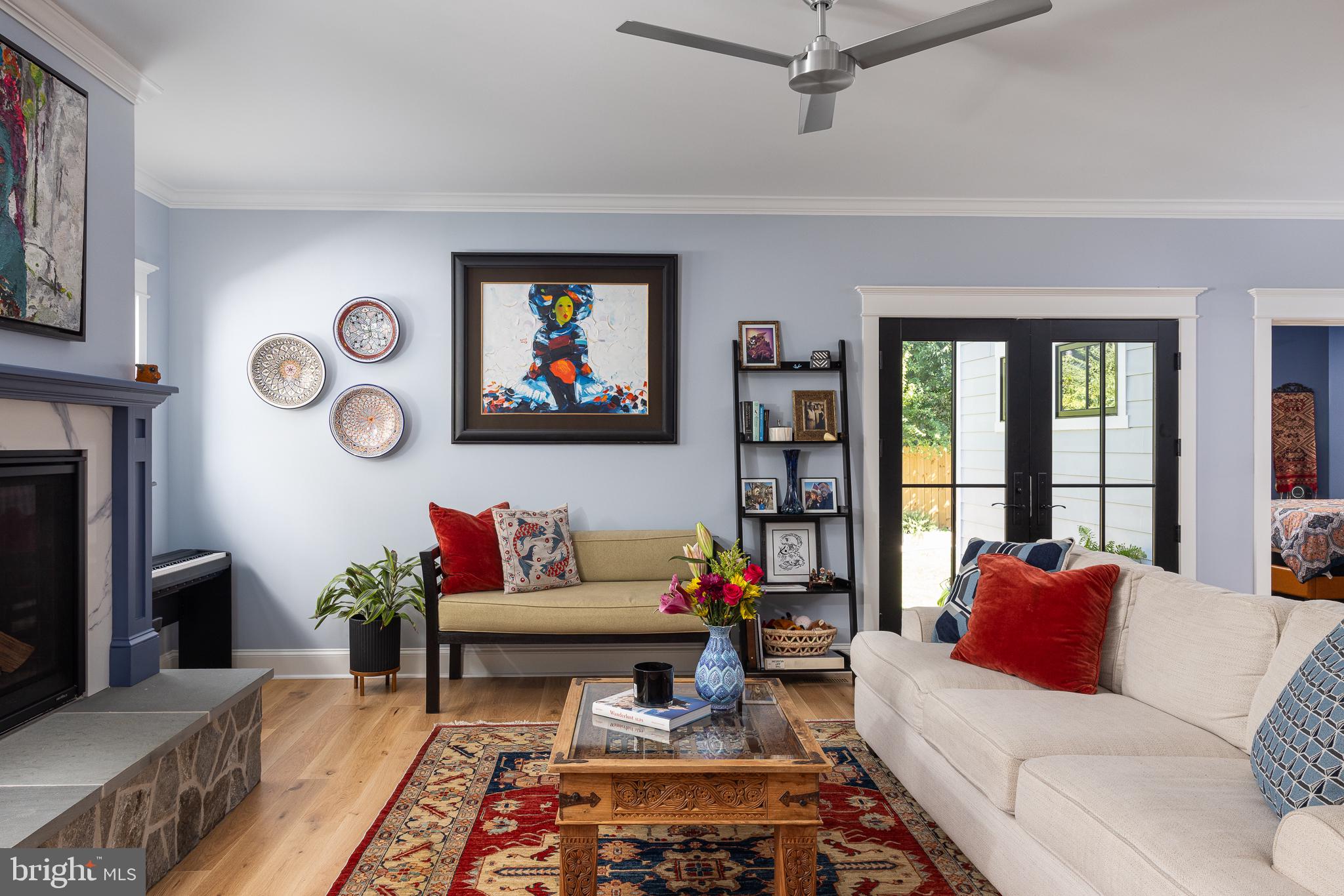 4905 16th Road North Arlington, VA 22207 - Photo 10 of 19 Charming living space with vibrant art.