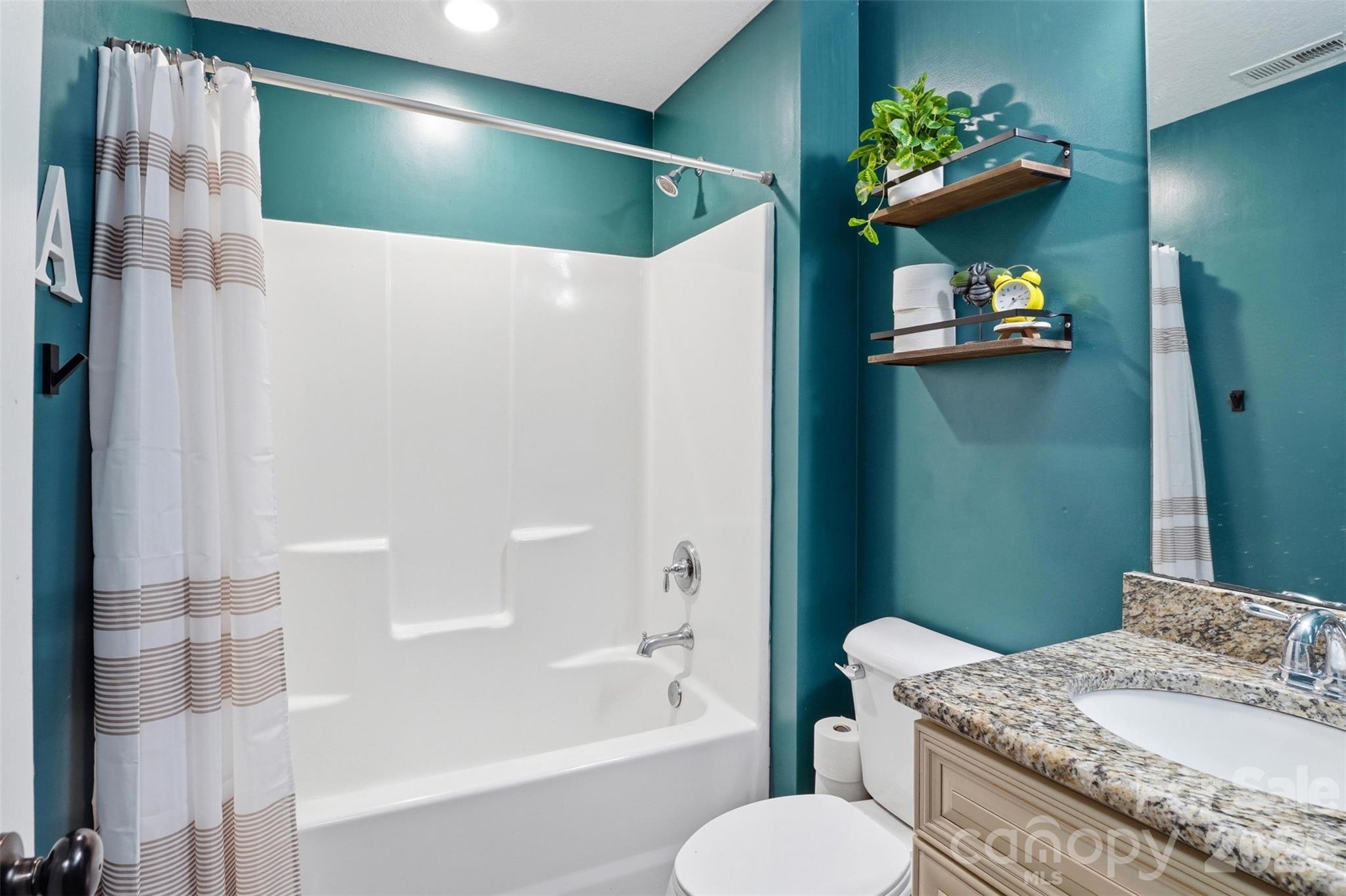 810 Tirzah Road York, SC 29745 - Photo 20 of 29 a bathroom with a granite countertop sink toilet and shower