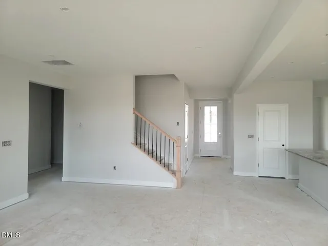 a view of a hallway with staircase