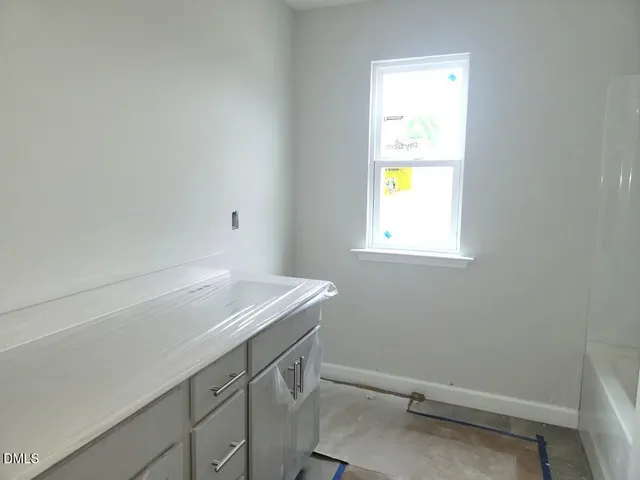 an empty room with a window