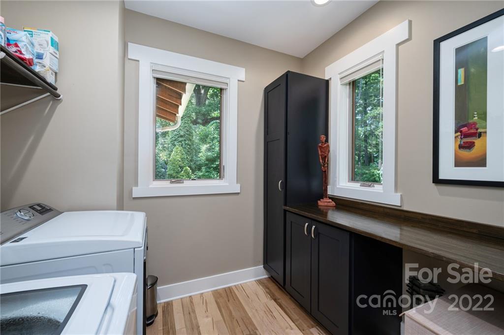 9 Kenilworth Road Asheville, NC 28803 - Photo 15 of 33 a room with a window and a hallway