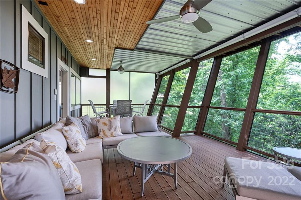 9 Kenilworth Road Asheville, NC 28803 - Photo 32 of 33 a living room with furniture and a large window