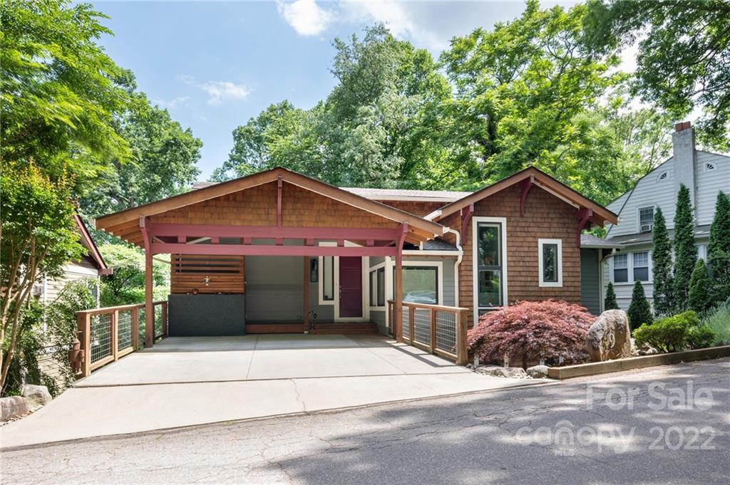 9 Kenilworth Road Asheville, NC 28803 - Photo 33 of 33 a front view of a house with a garden