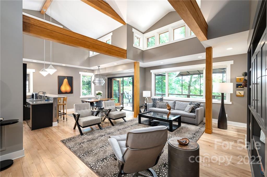 9 Kenilworth Road Asheville, NC 28803 - Photo 4 of 33 a living room with fireplace furniture and a large window