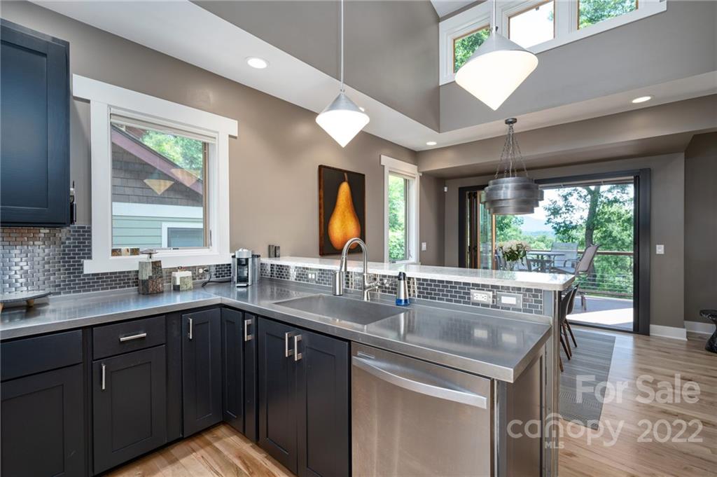 9 Kenilworth Road Asheville, NC 28803 - Photo 7 of 33 a kitchen with lots of counter space and a sink