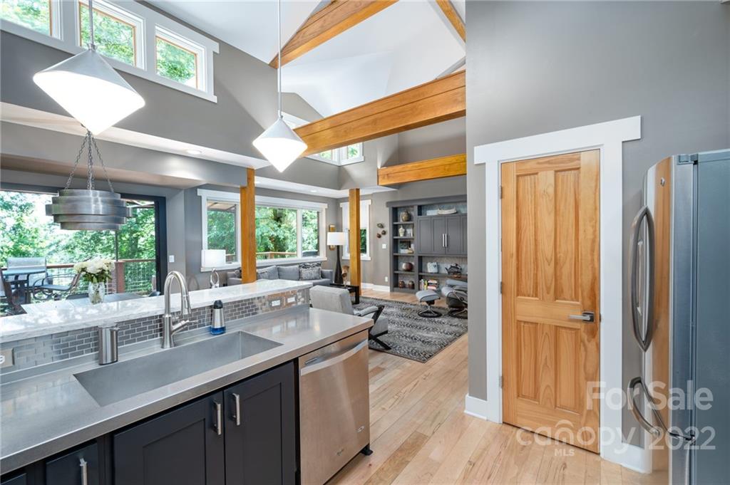 9 Kenilworth Road Asheville, NC 28803 - Photo 10 of 33 a kitchen with sink refrigerator and window