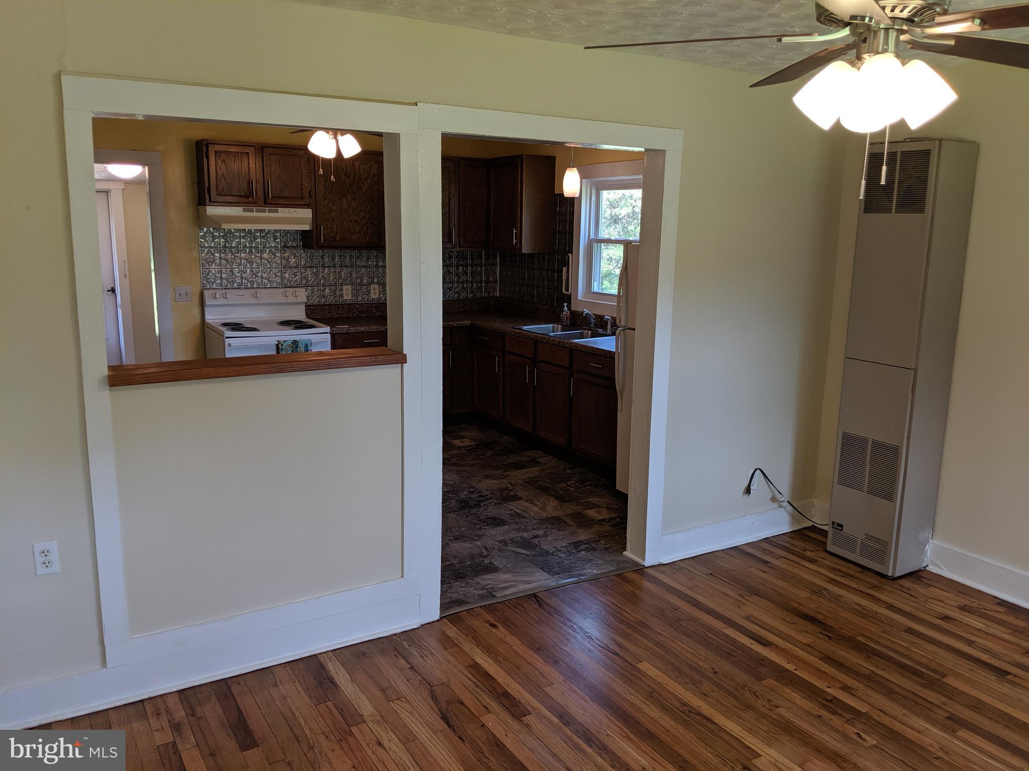 17227 Oakshade Road Orange, VA 22960 - Photo 6 of 28 Living room into kitchen