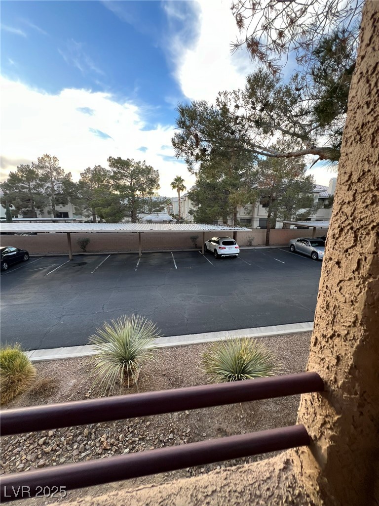 9325 West Desert Inn Road, Unit 206 Las Vegas, NV 89117 - Photo 25 of 37 View of partially covered parking lot