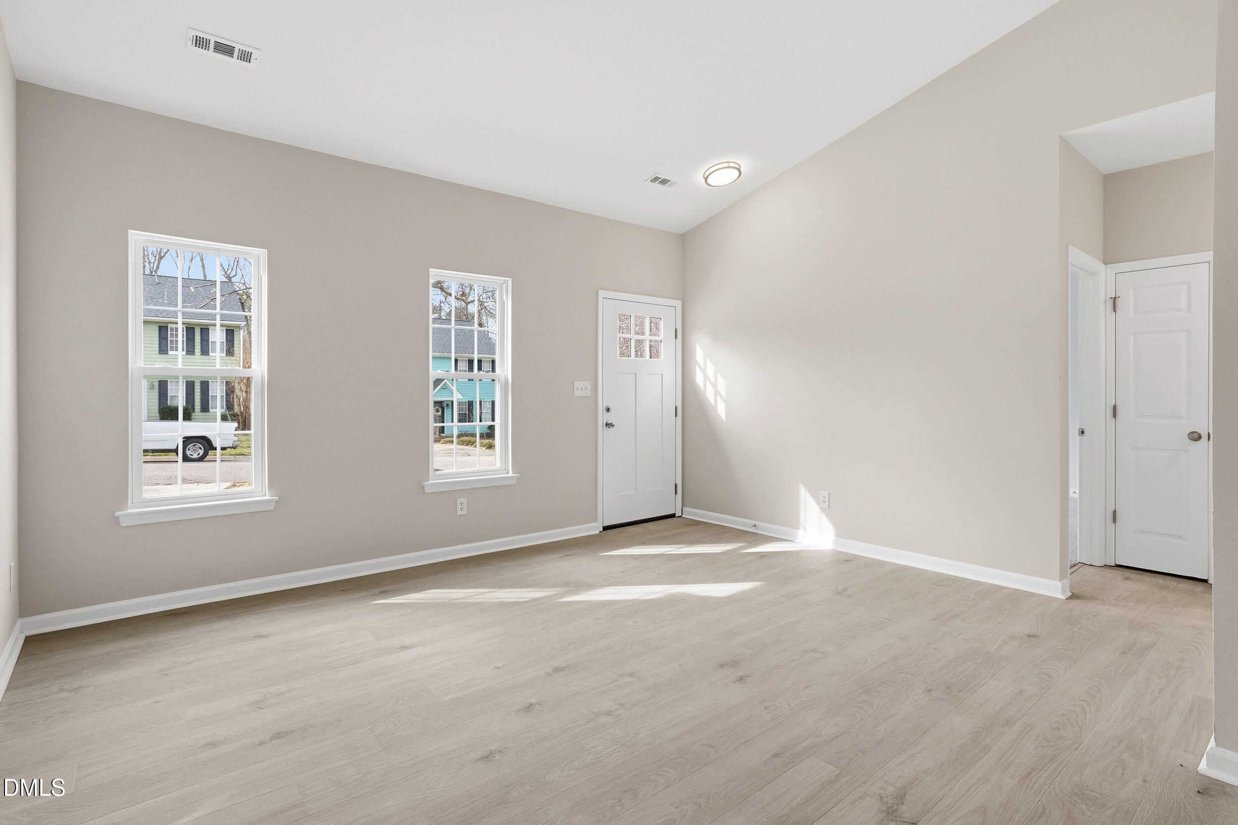 2020 Collier Road Durham, NC 27707 - Photo 12 of 32 a view of an empty room with a window