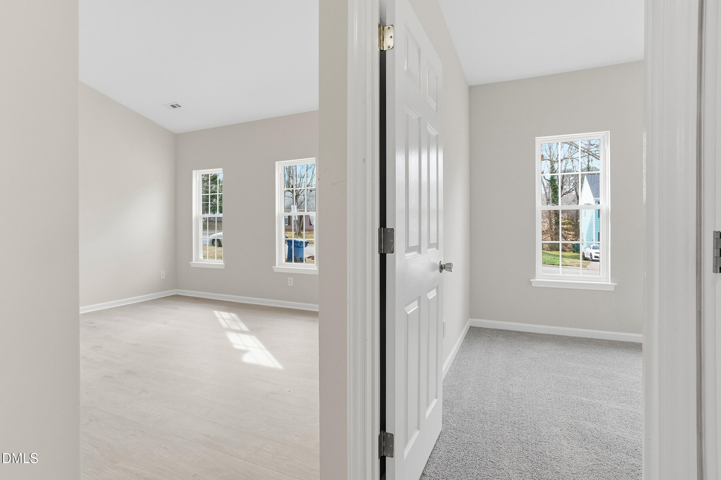 2020 Collier Road Durham, NC 27707 - Photo 19 of 32 a view of an empty room with a window