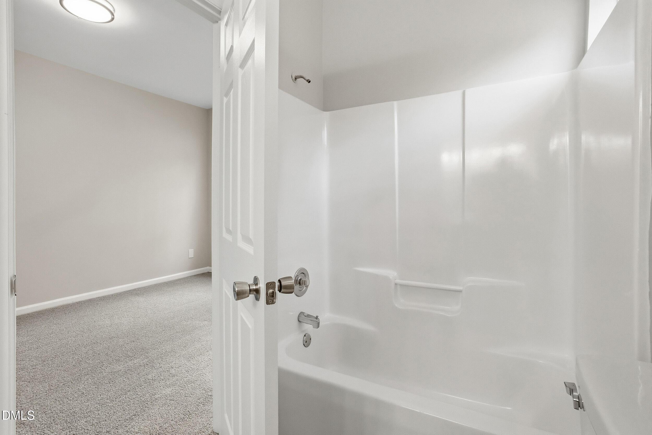 2020 Collier Road Durham, NC 27707 - Photo 25 of 32 a bathroom with a bathtub
