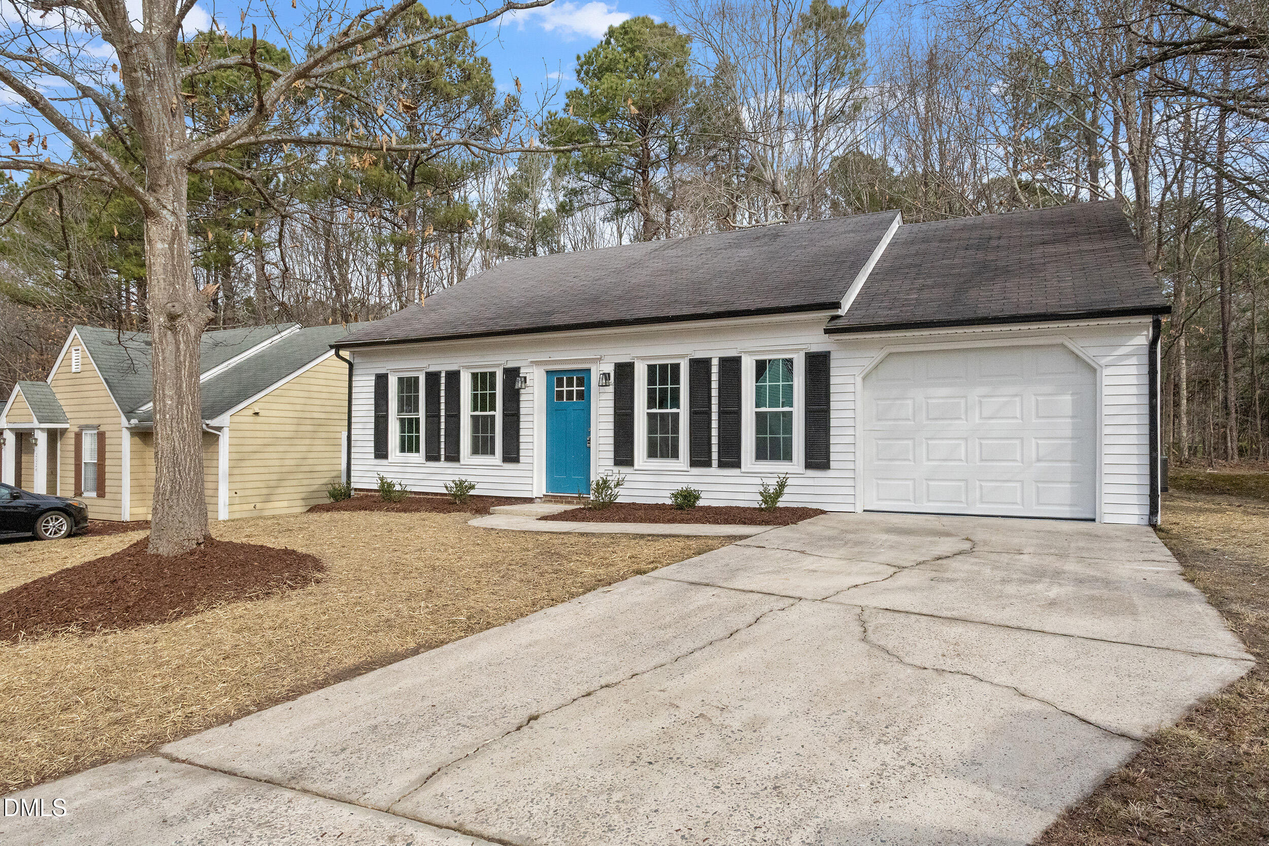 2020 Collier Road Durham, NC 27707 - Photo 27 of 32 front view of a house with a dry yard