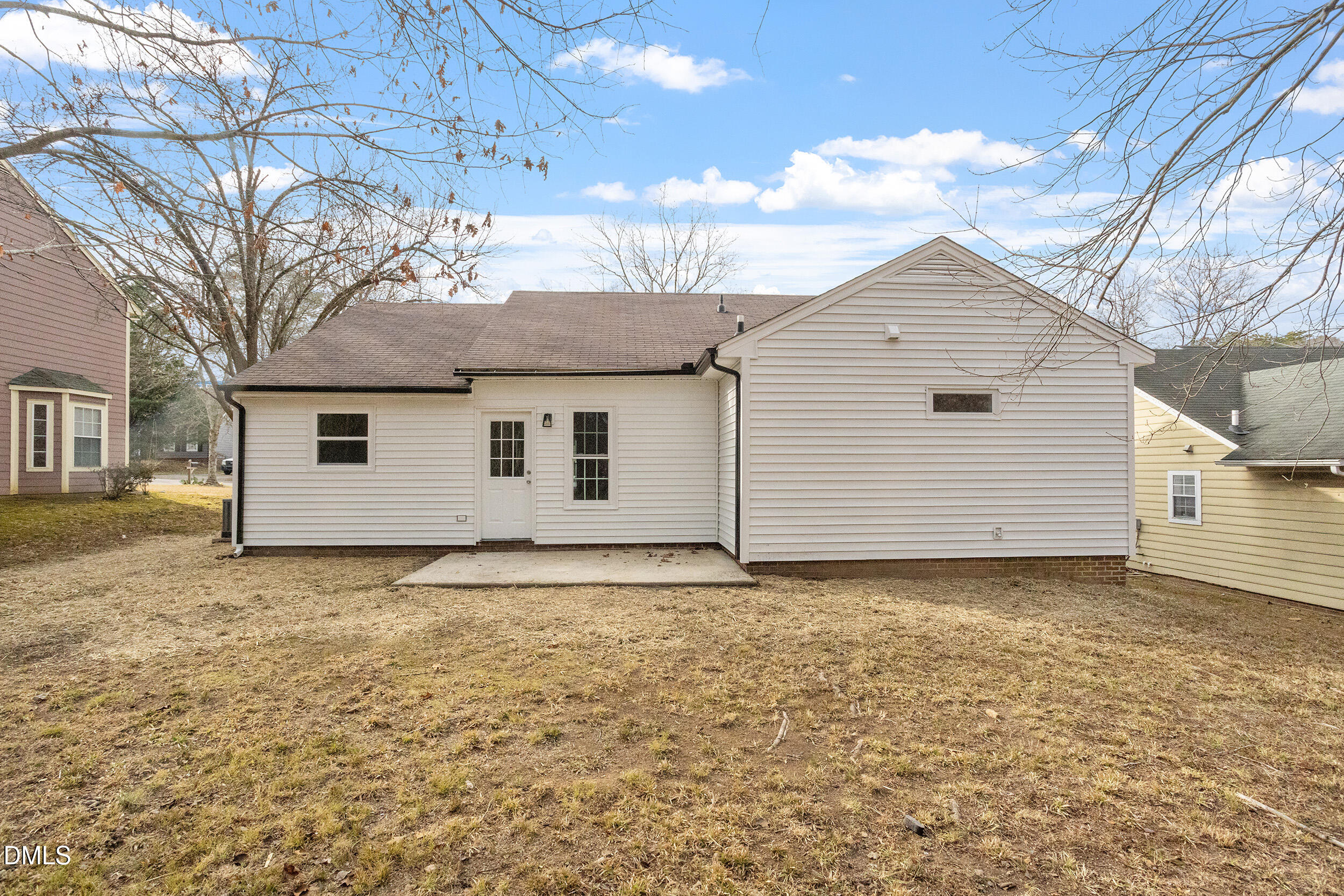 2020 Collier Road Durham, NC 27707 - Photo 30 of 32 a view of a house with a yard