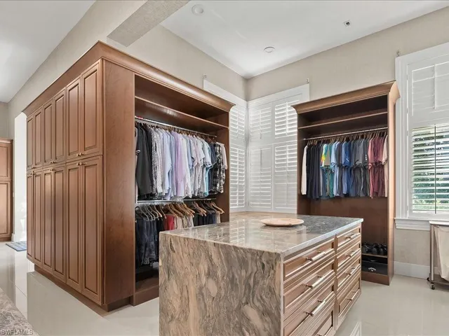 a view of kitchen island with sink