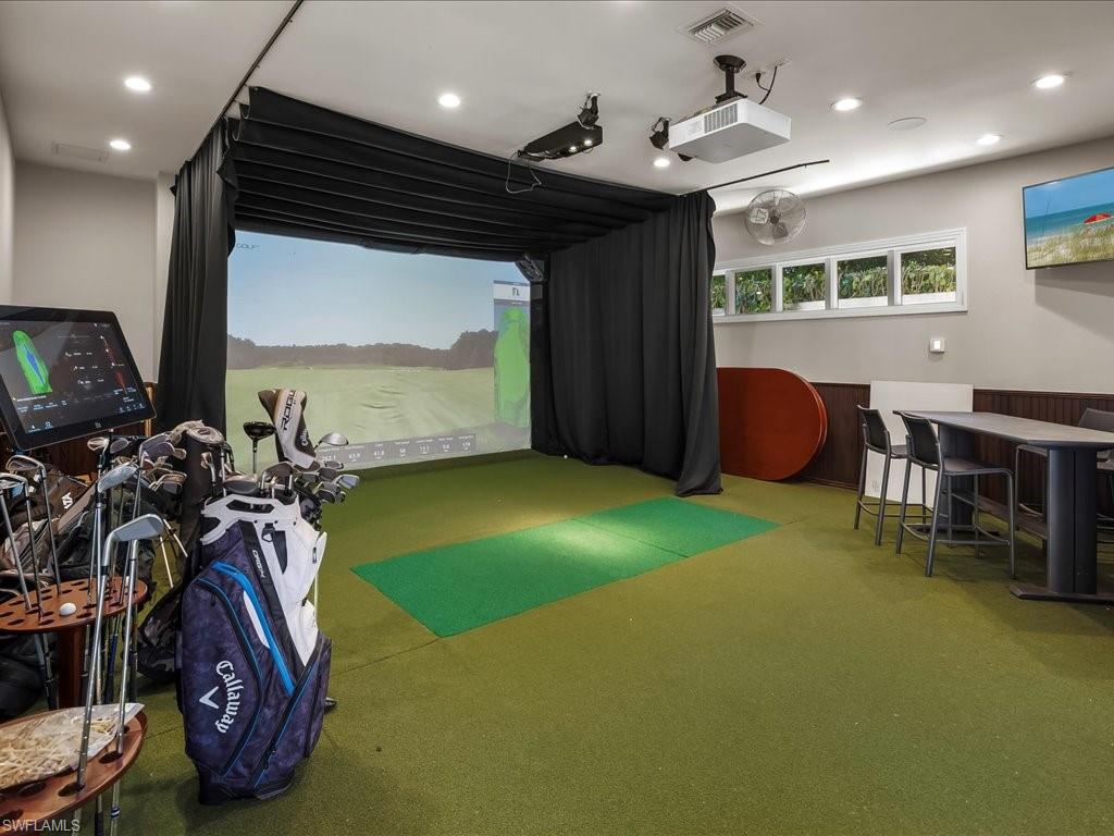 656 Hickory Road Naples, FL 34108 - Photo 38 of 50 a view of a room with gym equipment