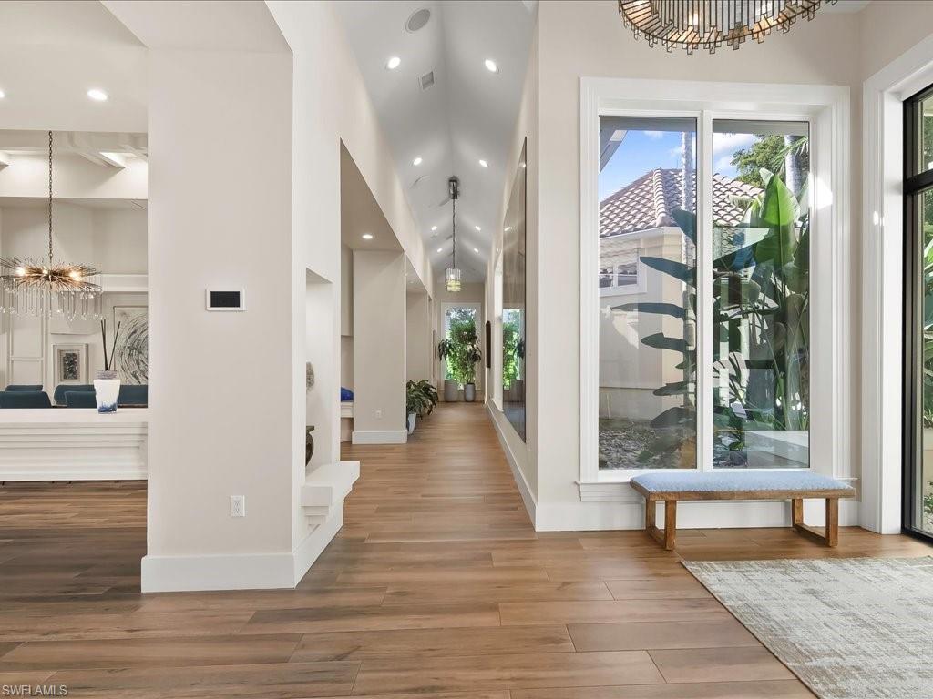 656 Hickory Road Naples, FL 34108 - Photo 7 of 50 a view of a building stairs and a hallway