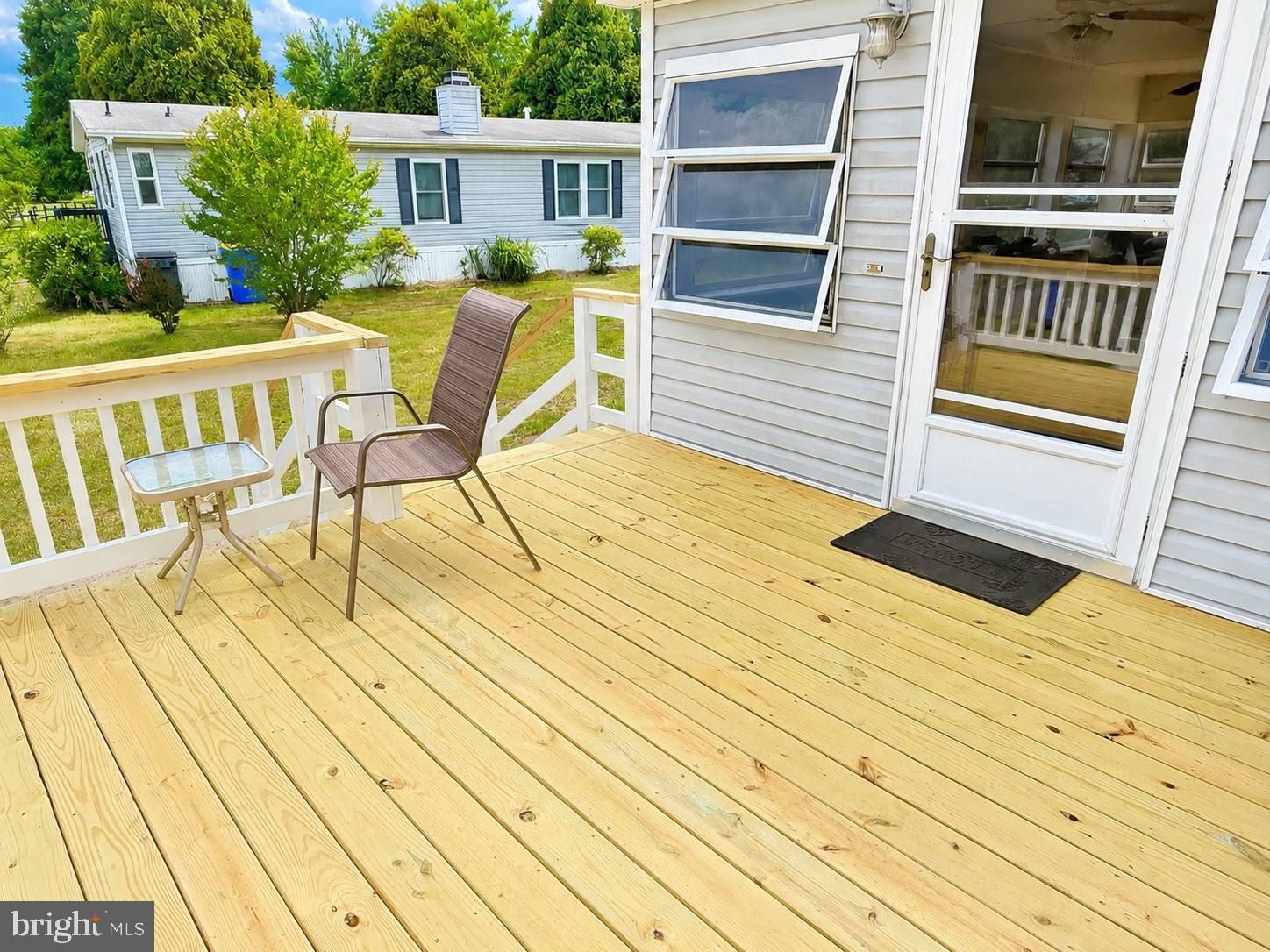 26482 Pontoon Road, Unit E920 Long Neck, DE 19966 - Photo 3 of 23 front deck