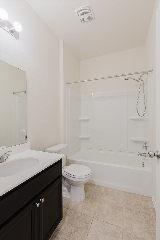 529 Gray Hawk Ridge Leander, TX 78641 - Photo 25 of 36 Full bathroom featuring vanity, shower / tub combination, and tile patterned floors