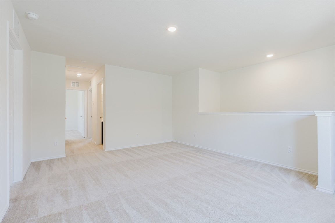 529 Gray Hawk Ridge Leander, TX 78641 - Photo 26 of 36 Spare room with recessed lighting and light carpet