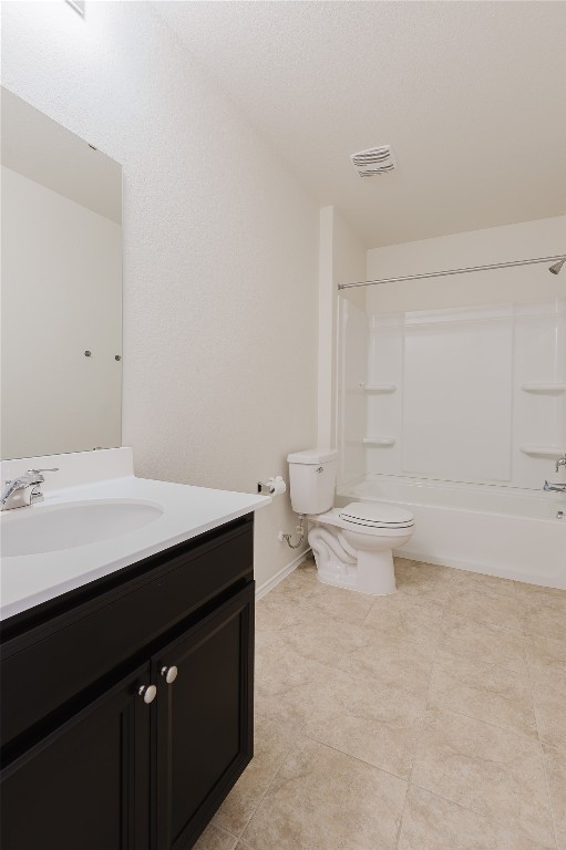 529 Gray Hawk Ridge Leander, TX 78641 - Photo 31 of 36 Bathroom featuring vanity, bathing tub / shower combination, and tile patterned flooring