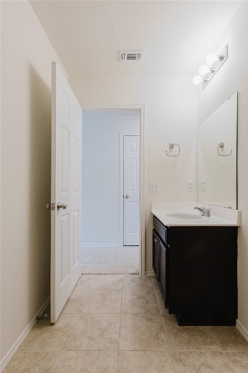529 Gray Hawk Ridge Leander, TX 78641 - Photo 32 of 36 Bathroom with vanity and tile patterned floors