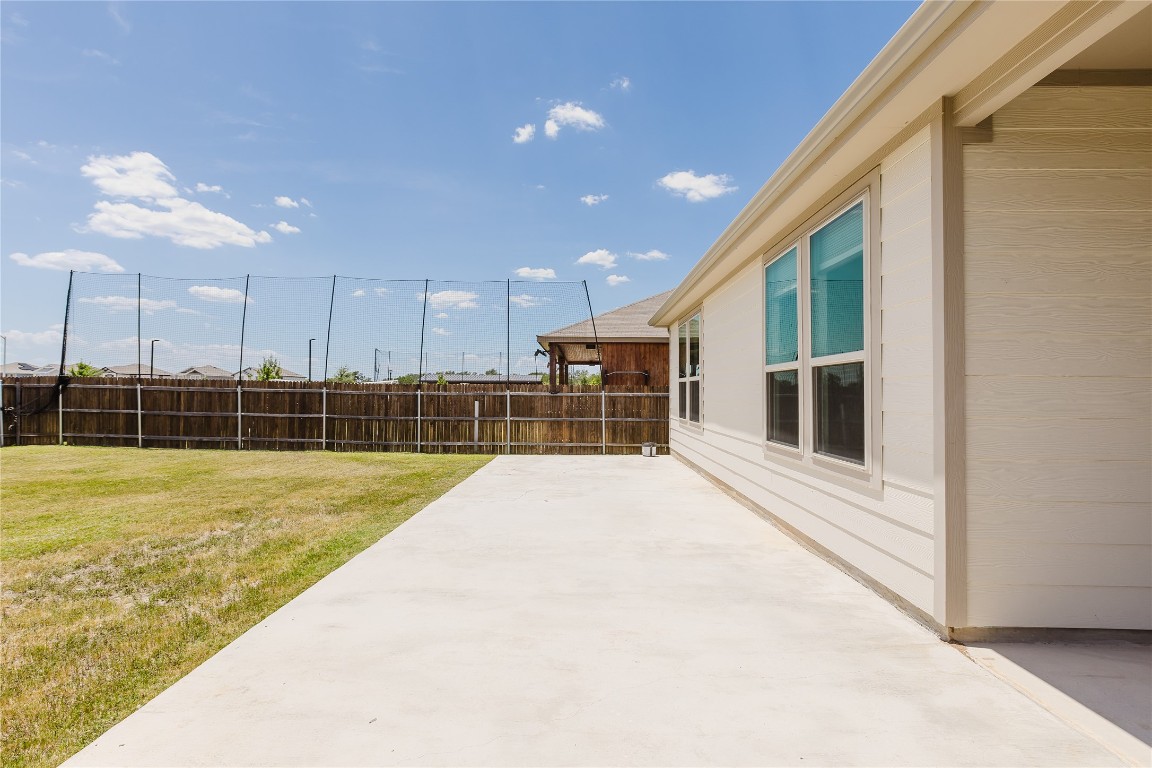 529 Gray Hawk Ridge Leander, TX 78641 - Photo 33 of 36 Fenced backyard with a patio area