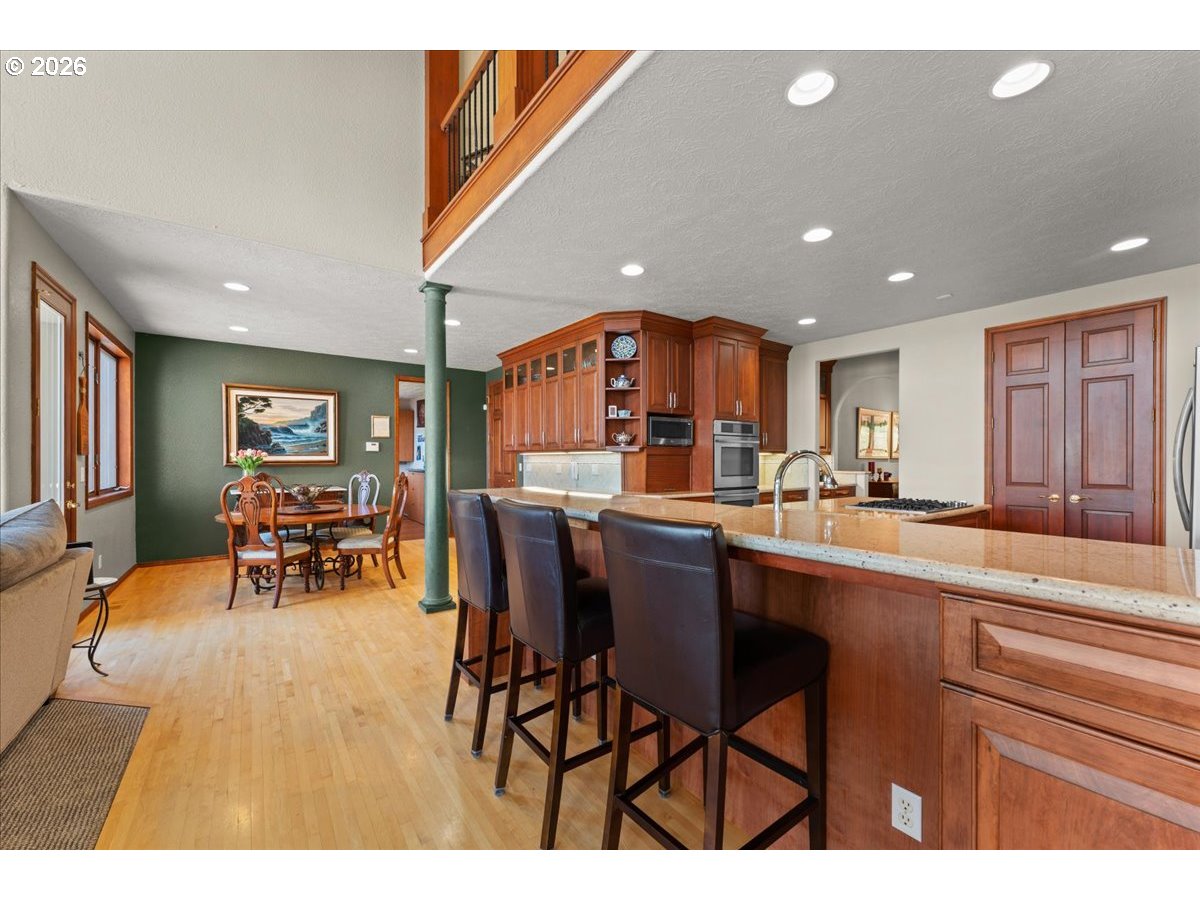 37123 Northeast Reed Road Corbett, OR 97019 - Photo 11 of 48 a kitchen with a table and chairs in it
