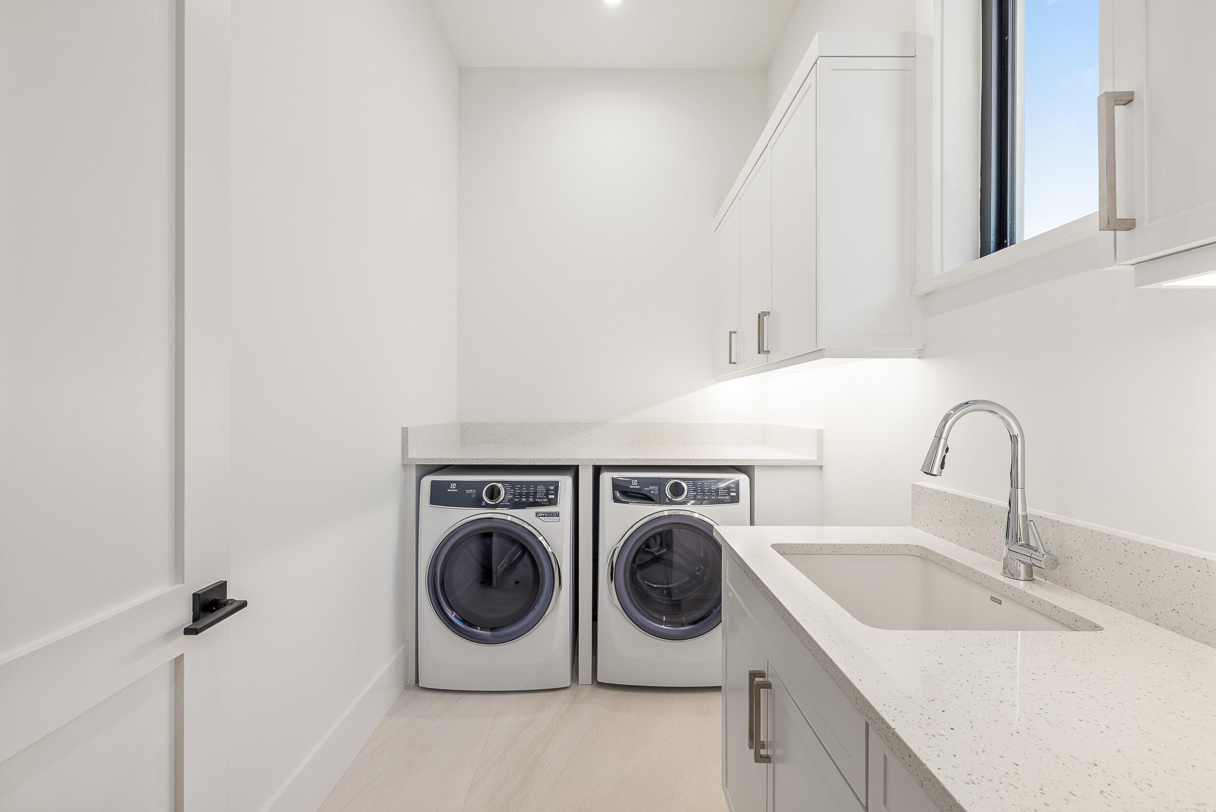 11331 Avery Road Palm Beach Gardens, FL 33410 - Photo 29 of 32 1st floor Laundry