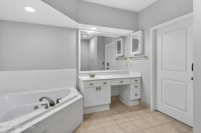 an empty room with a empty space and window