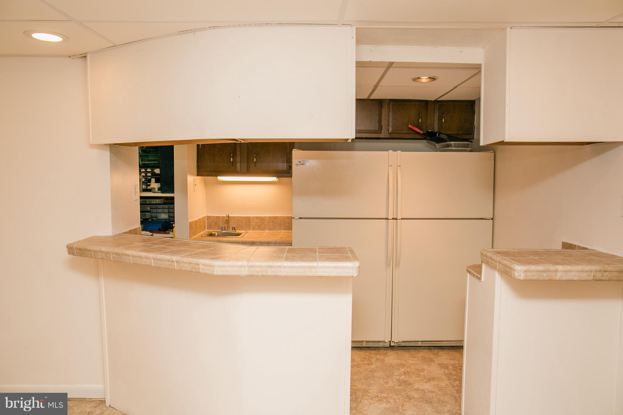 1750 Walnut Road Port Republic, MD 20676 - Photo 14 of 24 Kitchenette/Bar area in basement