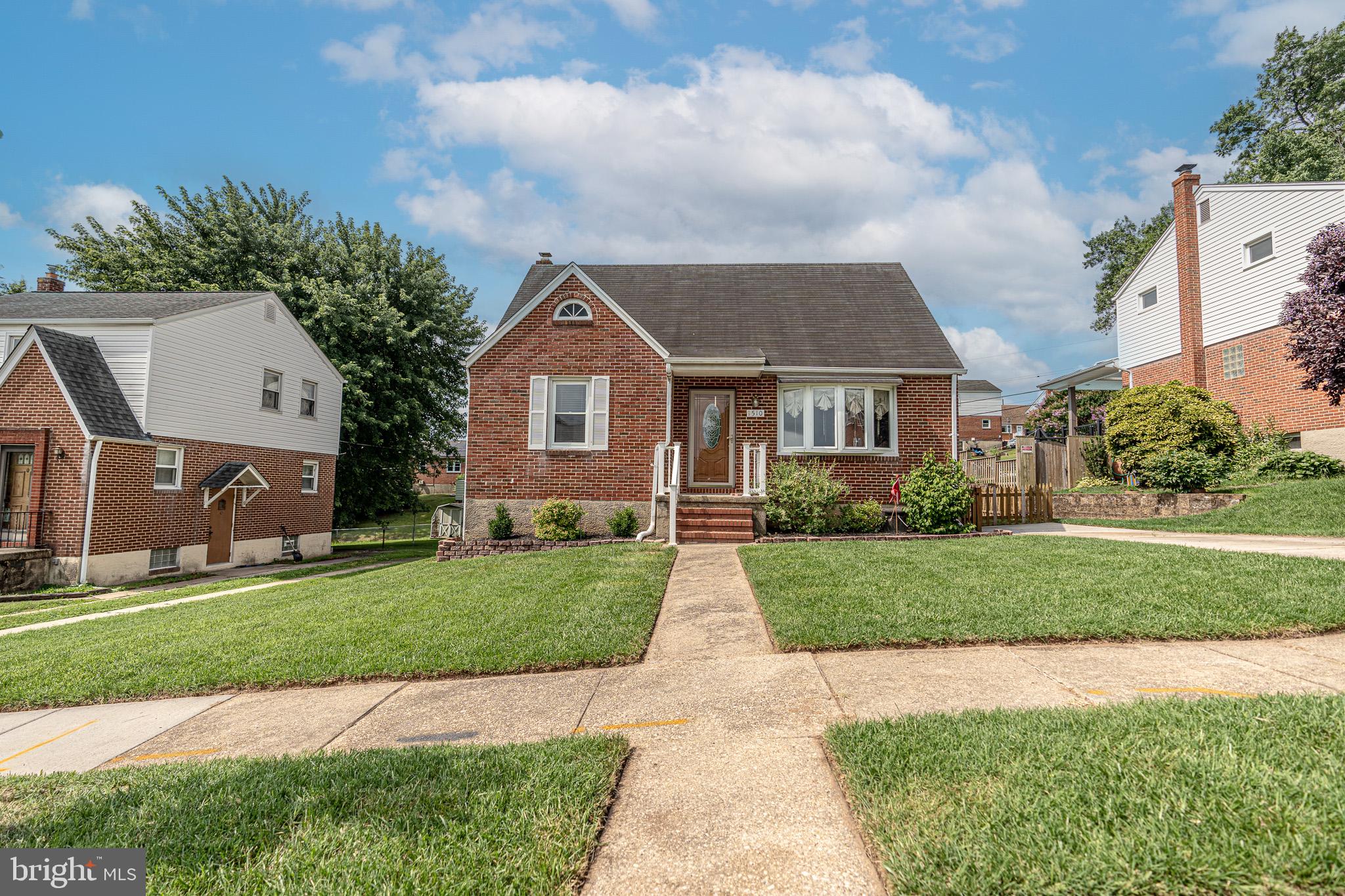 1510 Seling Avenue Rosedale, MD 21237 - Photo 1 of 24 a front view of a house with a yard