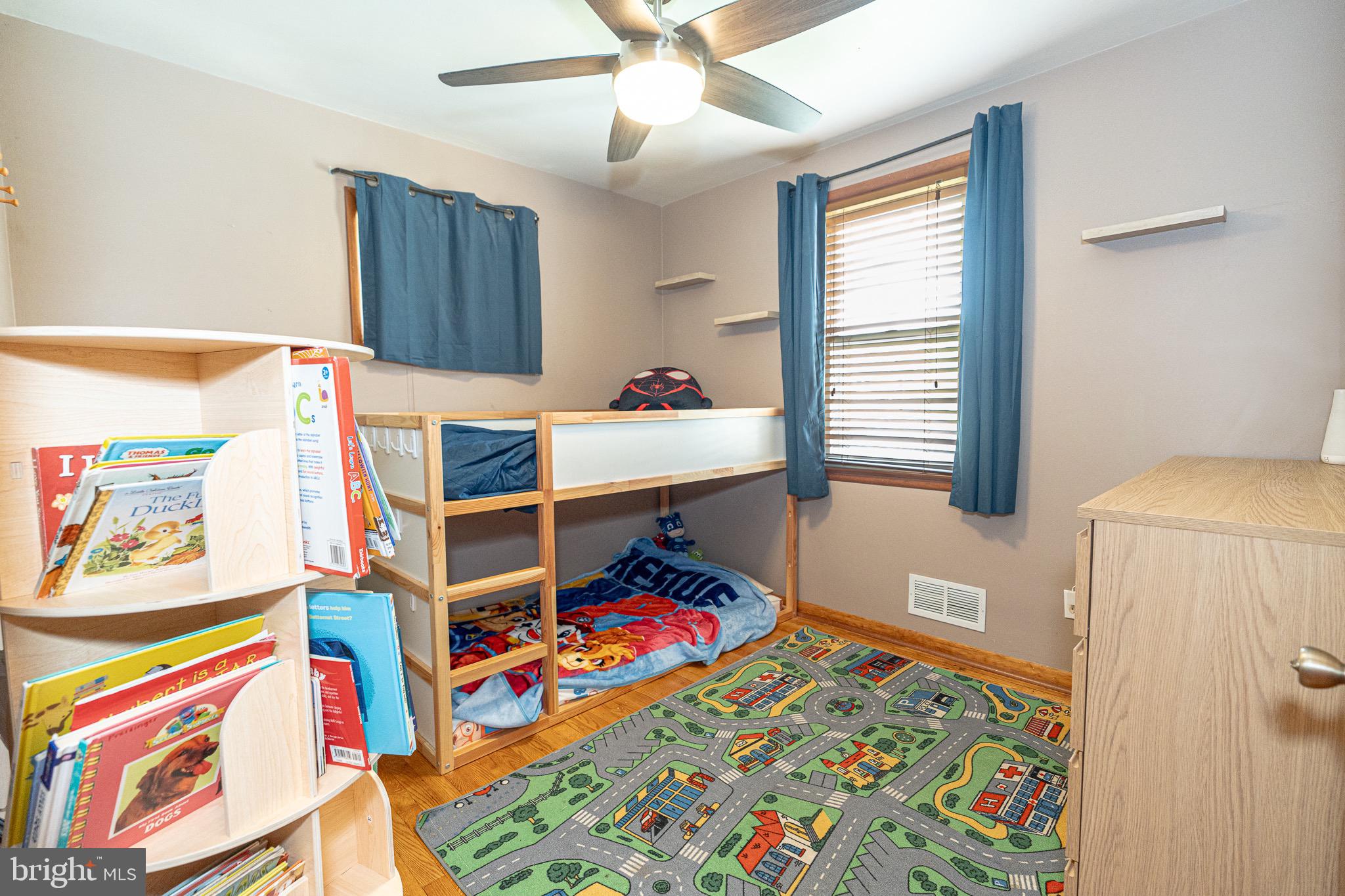 1510 Seling Avenue Rosedale, MD 21237 - Photo 11 of 24 a bedroom with a bed and a cabinets