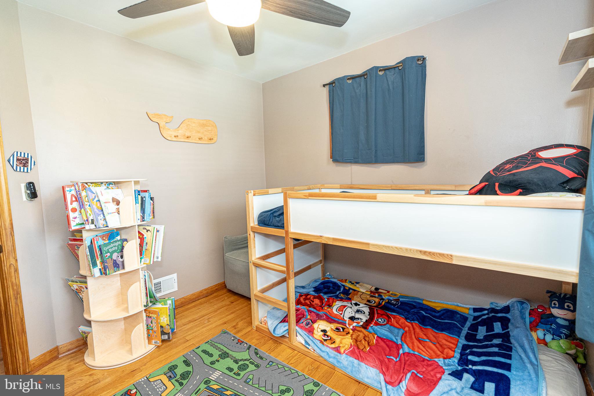 1510 Seling Avenue Rosedale, MD 21237 - Photo 12 of 24 a living room with furniture and a baby crib