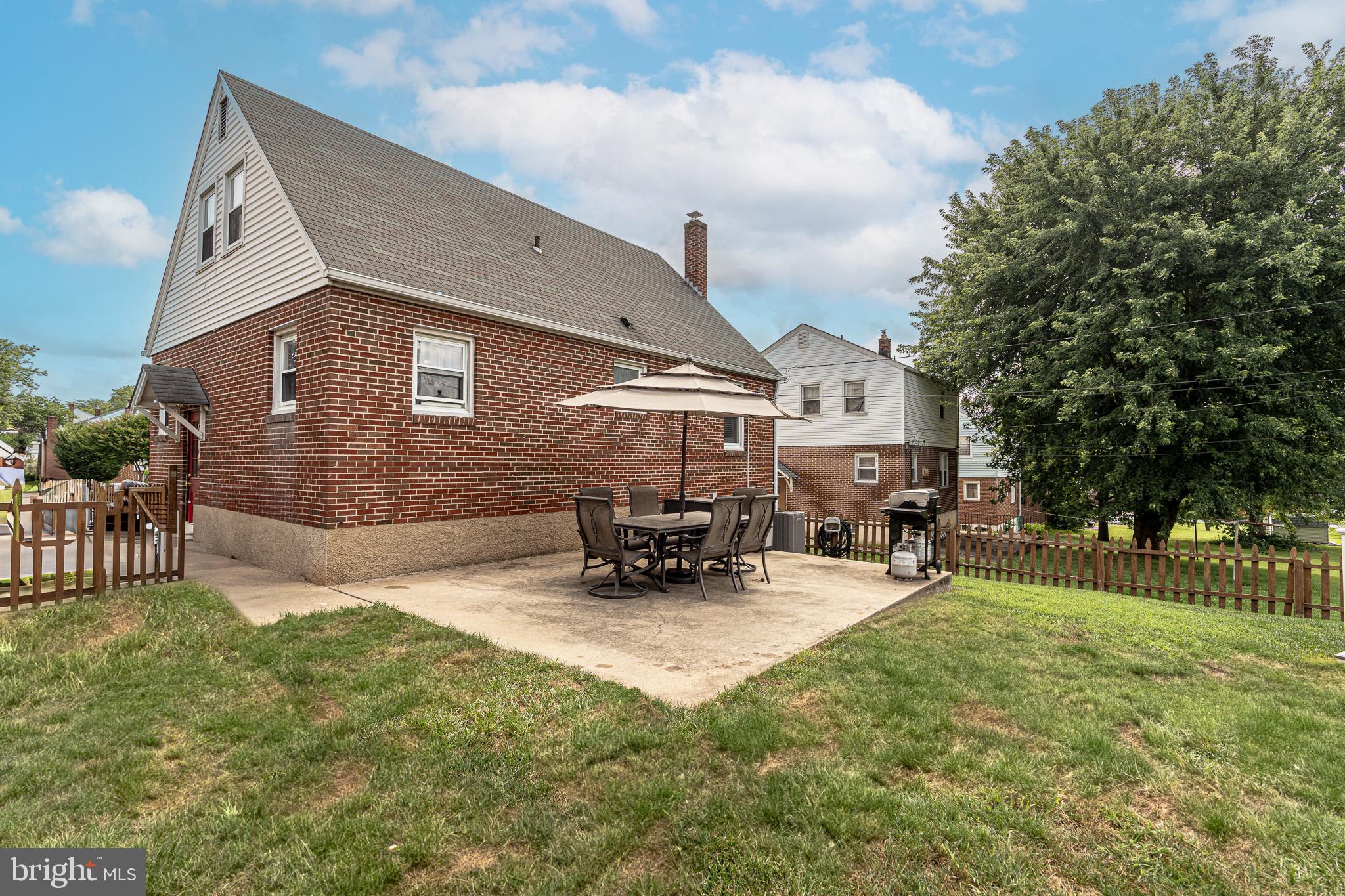 1510 Seling Avenue Rosedale, MD 21237 - Photo 21 of 24 a backyard of a house with table and chairs