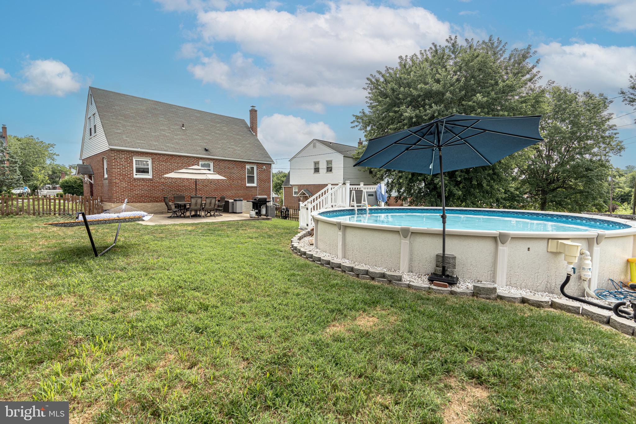 1510 Seling Avenue Rosedale, MD 21237 - Photo 22 of 24 a view of a house with a yard and sitting area