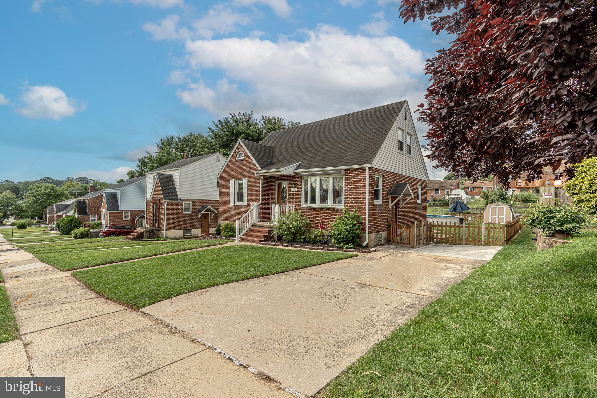 1510 Seling Avenue Rosedale, MD 21237 - Photo 24 of 24 a front view of a house with a yard and trees