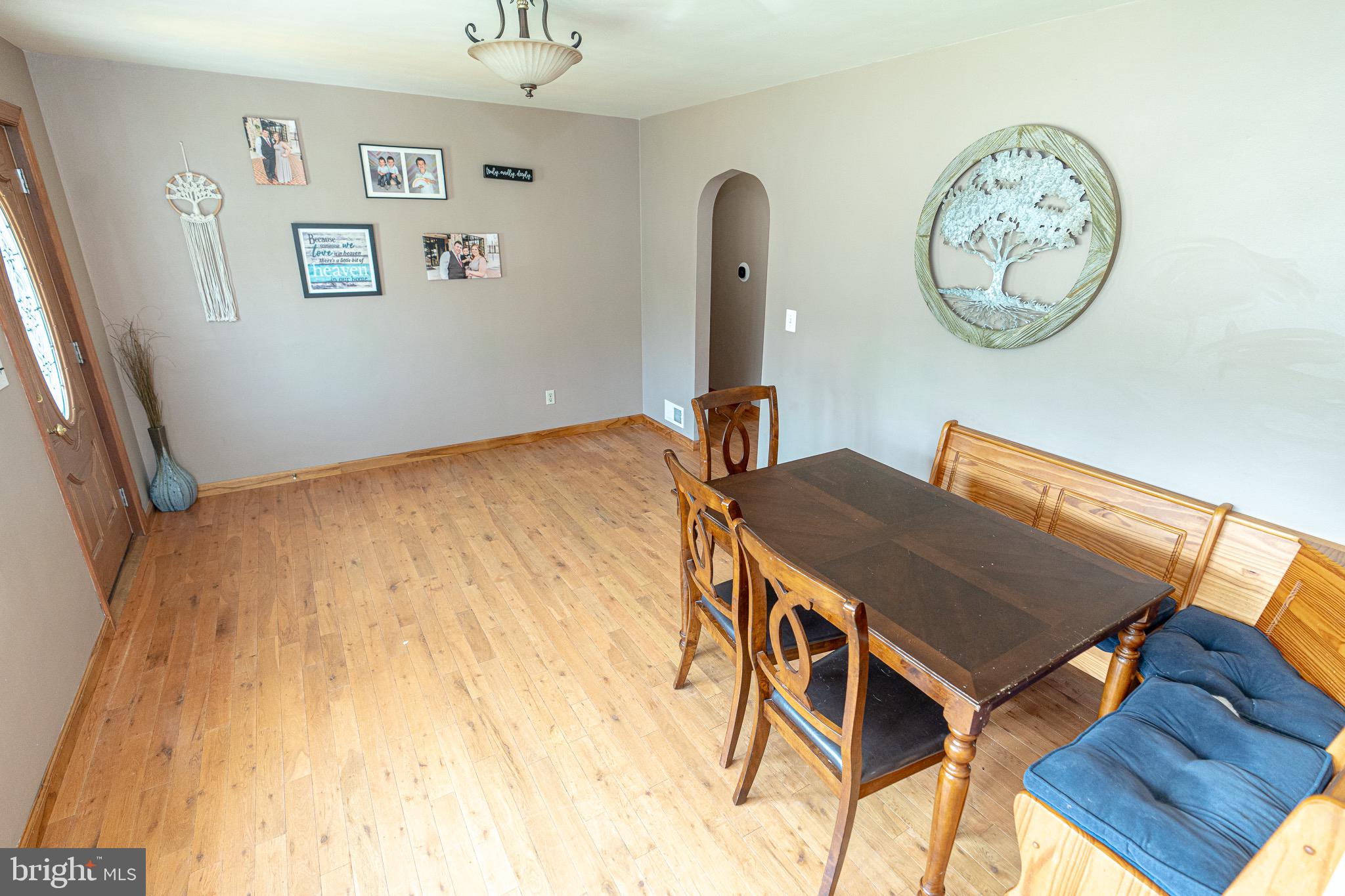 1510 Seling Avenue Rosedale, MD 21237 - Photo 4 of 24 a view of a hallway with paintings on the wall