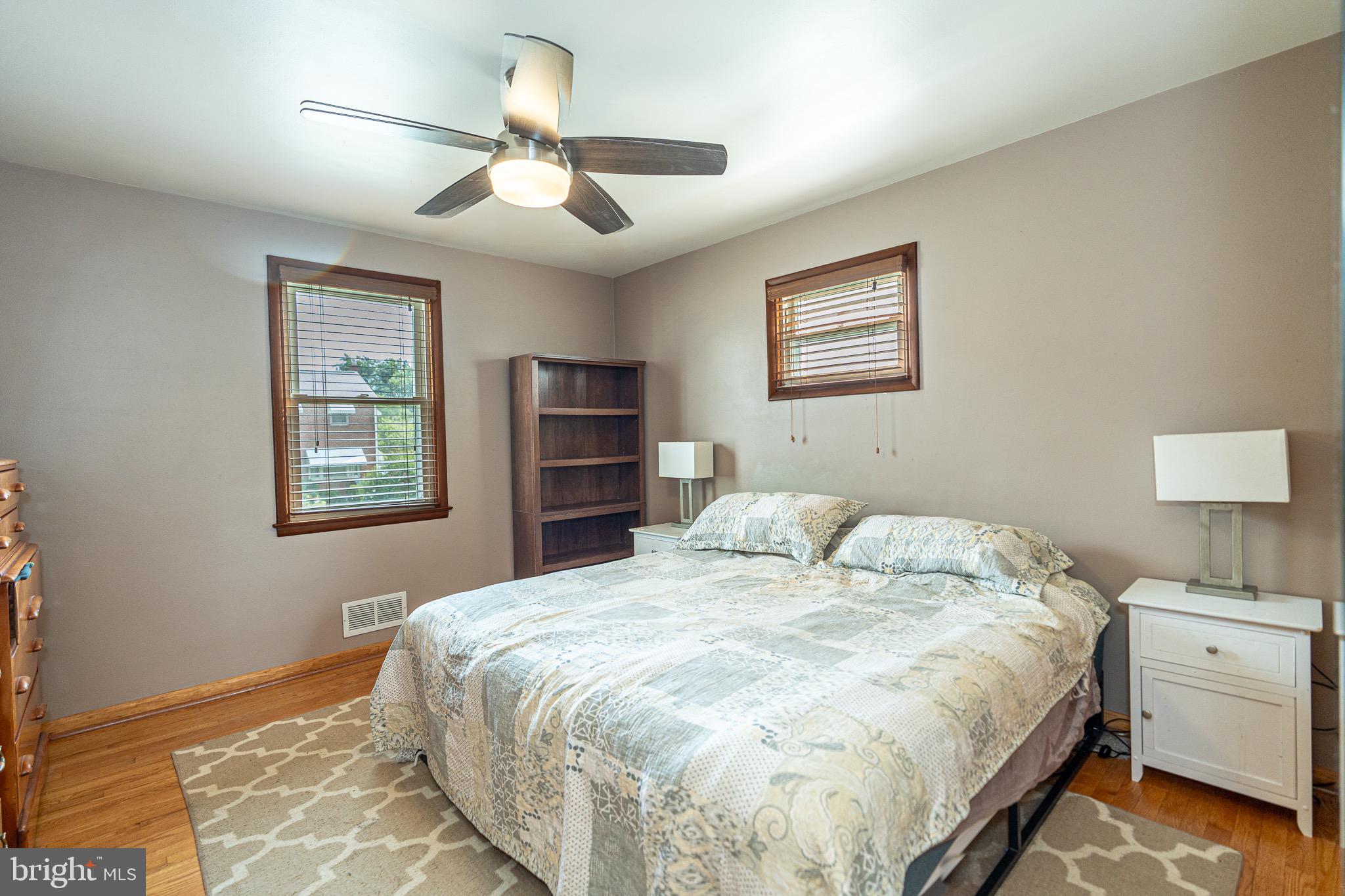 1510 Seling Avenue Rosedale, MD 21237 - Photo 10 of 24 a bedroom with a large bed and a window