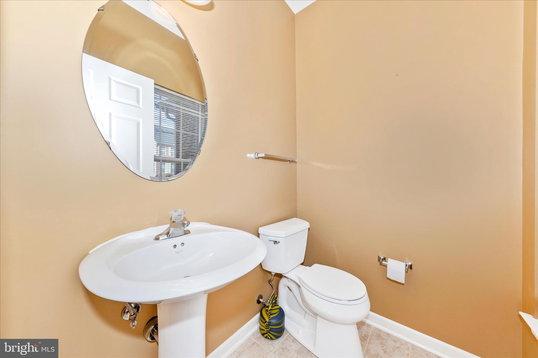 12406 Fallen Timbers Circle Hagerstown, MD 21740 - Photo 18 of 52 a bathroom with a sink and a mirror