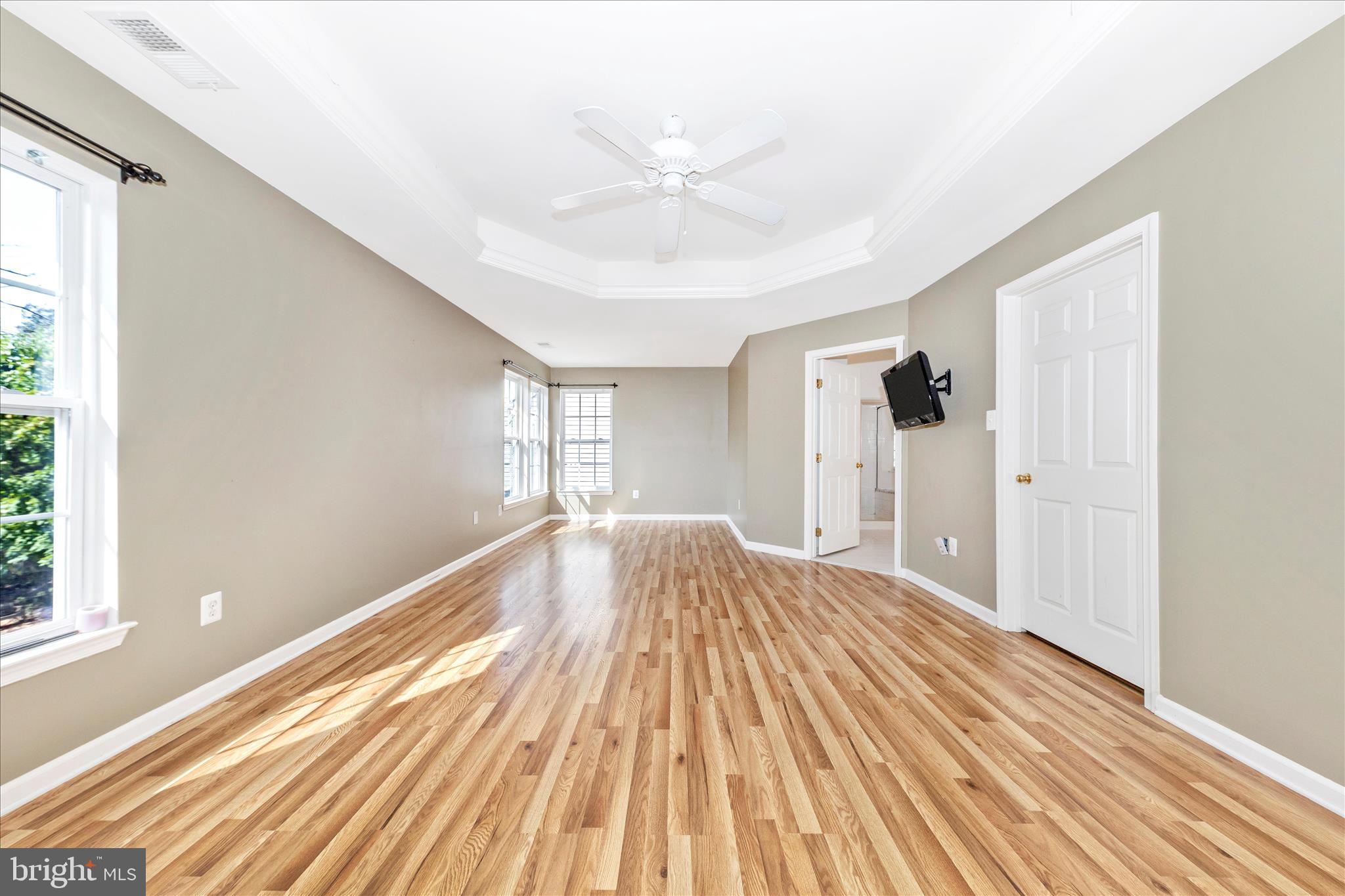 12406 Fallen Timbers Circle Hagerstown, MD 21740 - Photo 22 of 52 a view of a livingroom with wooden floor and window