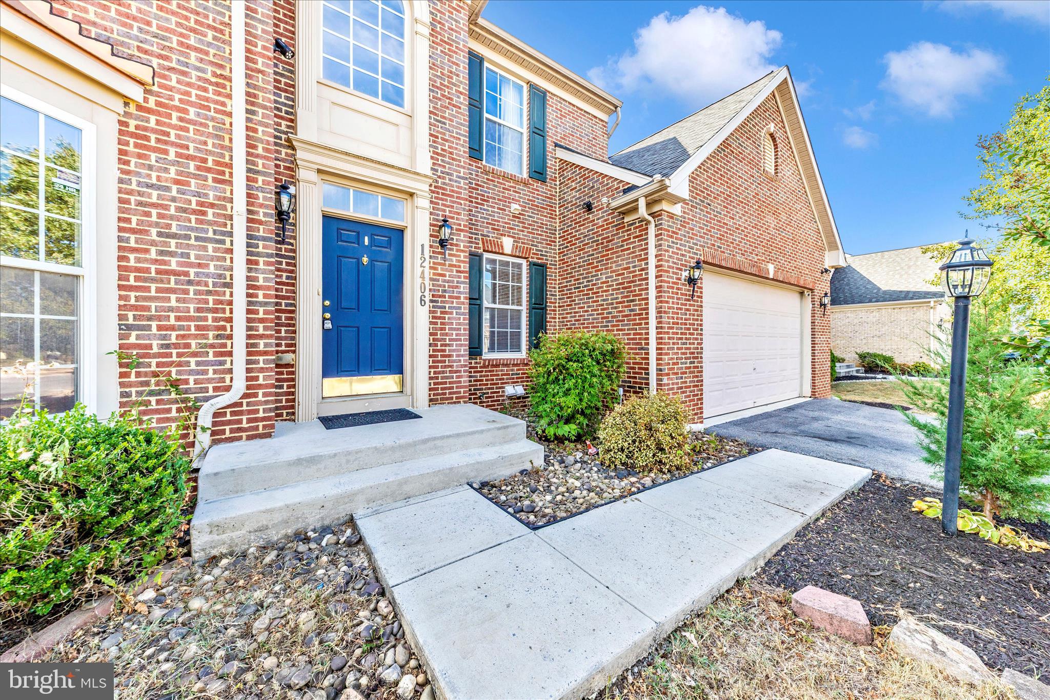 12406 Fallen Timbers Circle Hagerstown, MD 21740 - Photo 39 of 52 a view of a house with a yard