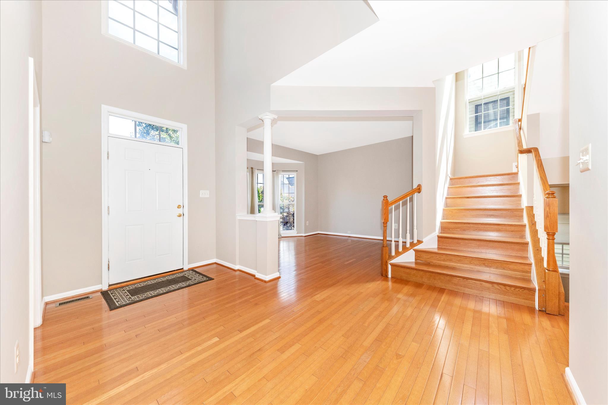 12406 Fallen Timbers Circle Hagerstown, MD 21740 - Photo 4 of 52 a view of a room with wooden floor and stairs